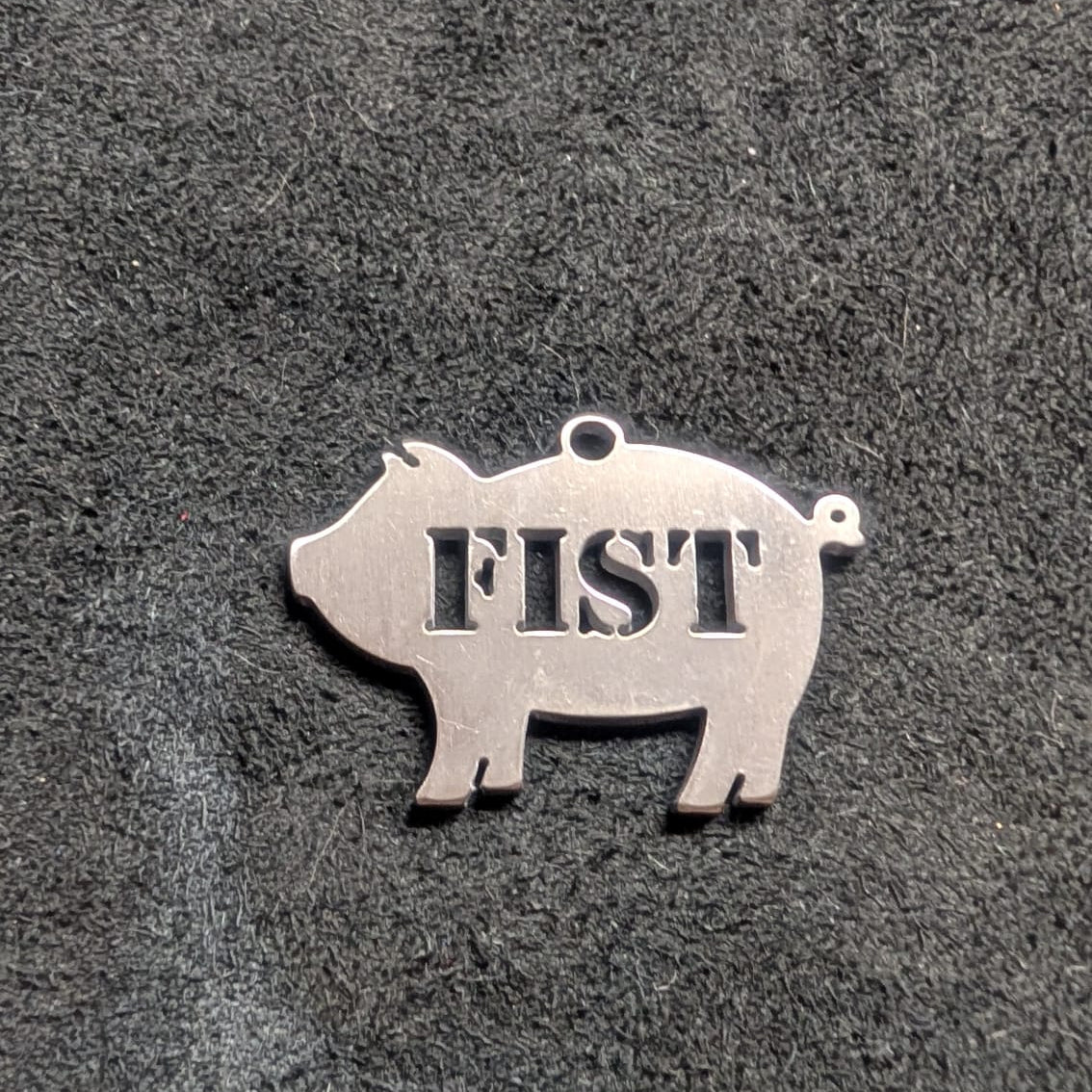 Fist Pig Tag