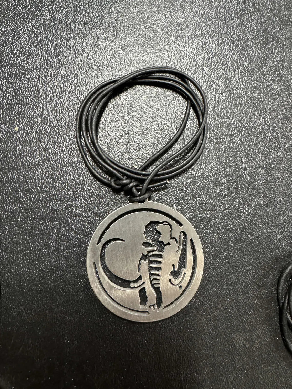 Mastadon Power Coin Pendant